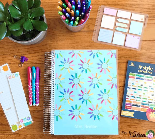 Photo of Erin Condren Teacher Planner and accessories