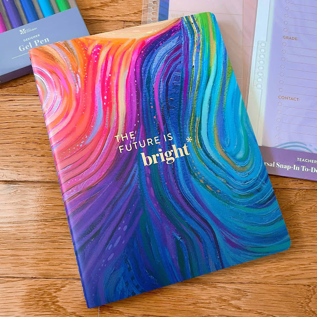 Photo of Erin Condren teacher record book with text, "The Future is Bright" on the front cover.