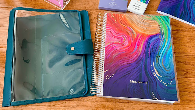 Photo of the new Erin Condren teacher lesson planner with the large clear planner folio.