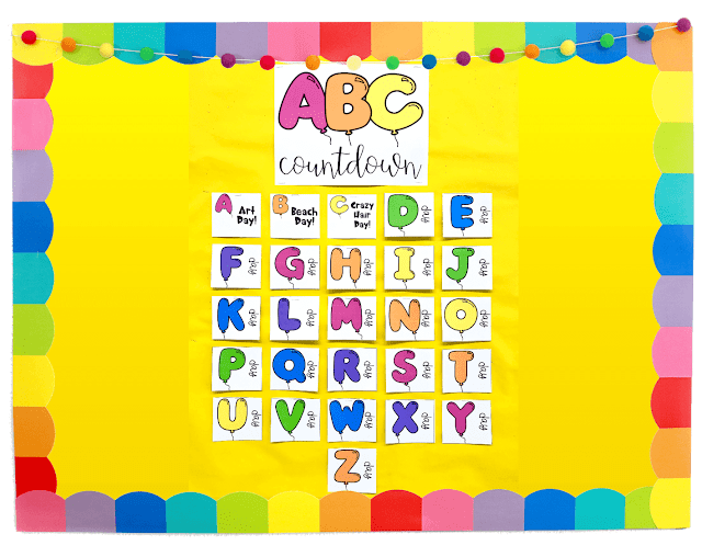 Photo of ABC Countdown on a bulletin board with yellow background and rainbow border.
