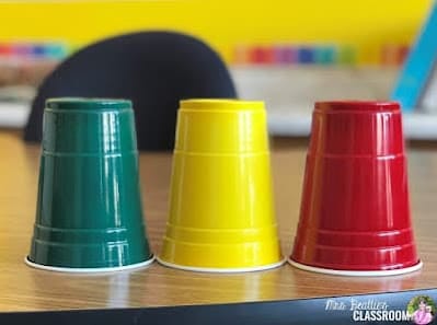 Fixing classroom noise problems: green, yellow, and red Solo cups for noise level indicators