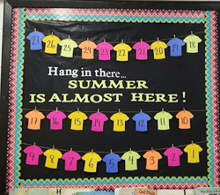 Bulletin  Board Countdown to Summer with numbered t-shirts.