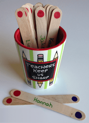 Photo of student selector sticks in a cup that says, "Teachers Keep Us Sharp."