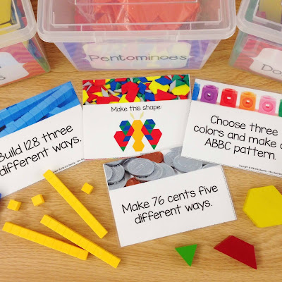 Photo of math morning work task cards with a variety of math manipulatives and bins.