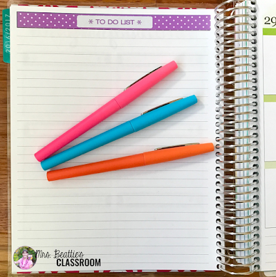 Photo of Erin Condren planner and markers.